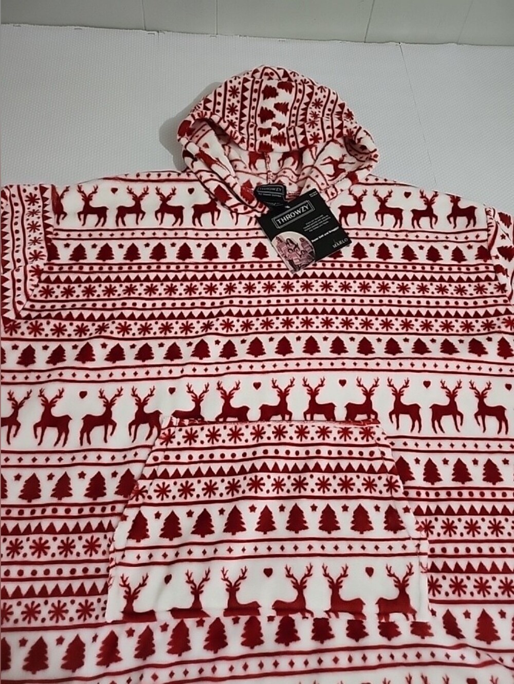 Throwzy wearable blanket hoodie features a red and white reindeer holiday patter - Picture 2 of 12